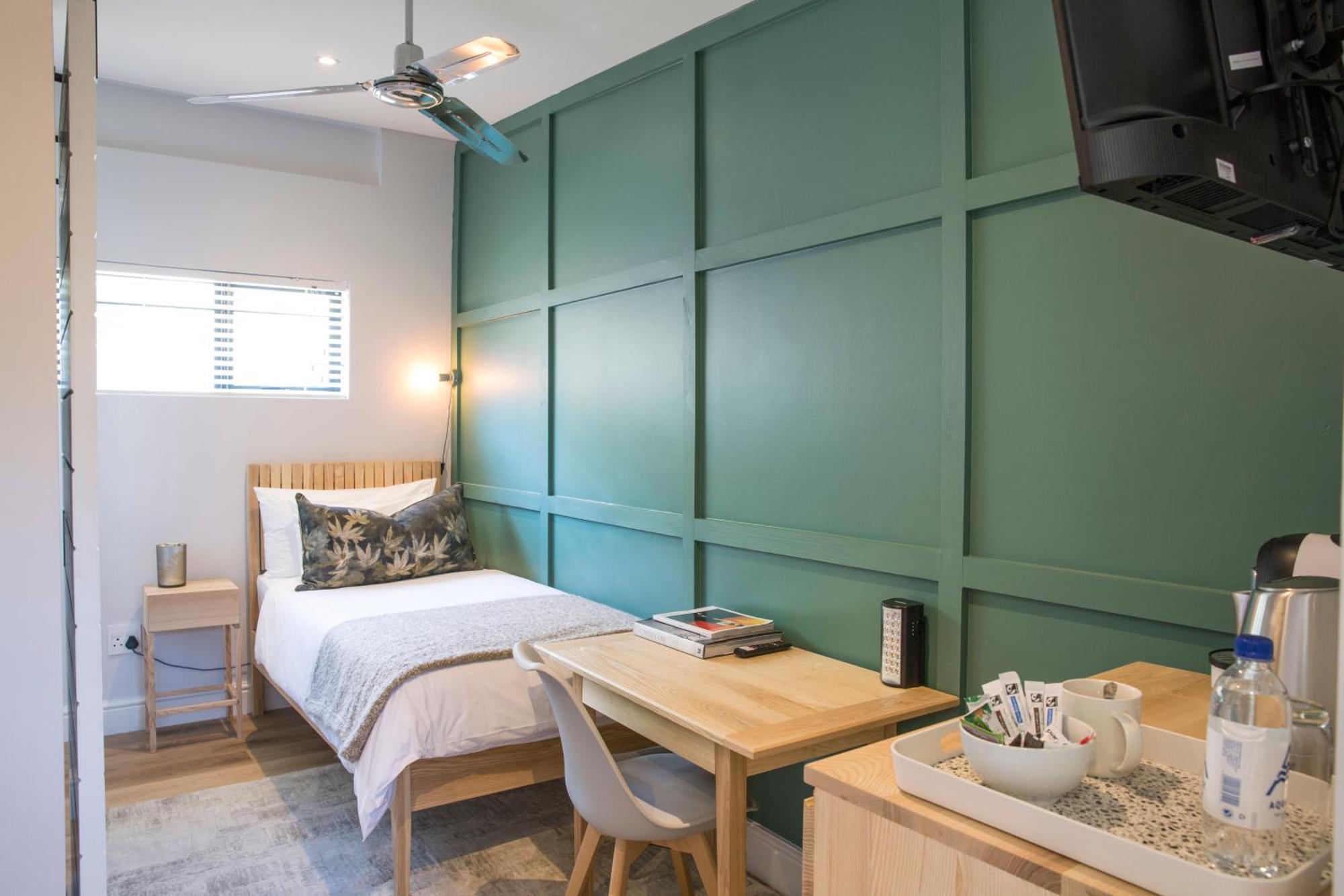 Antrim Boutique Hotel By Totalstay Кейптаун Номер фото